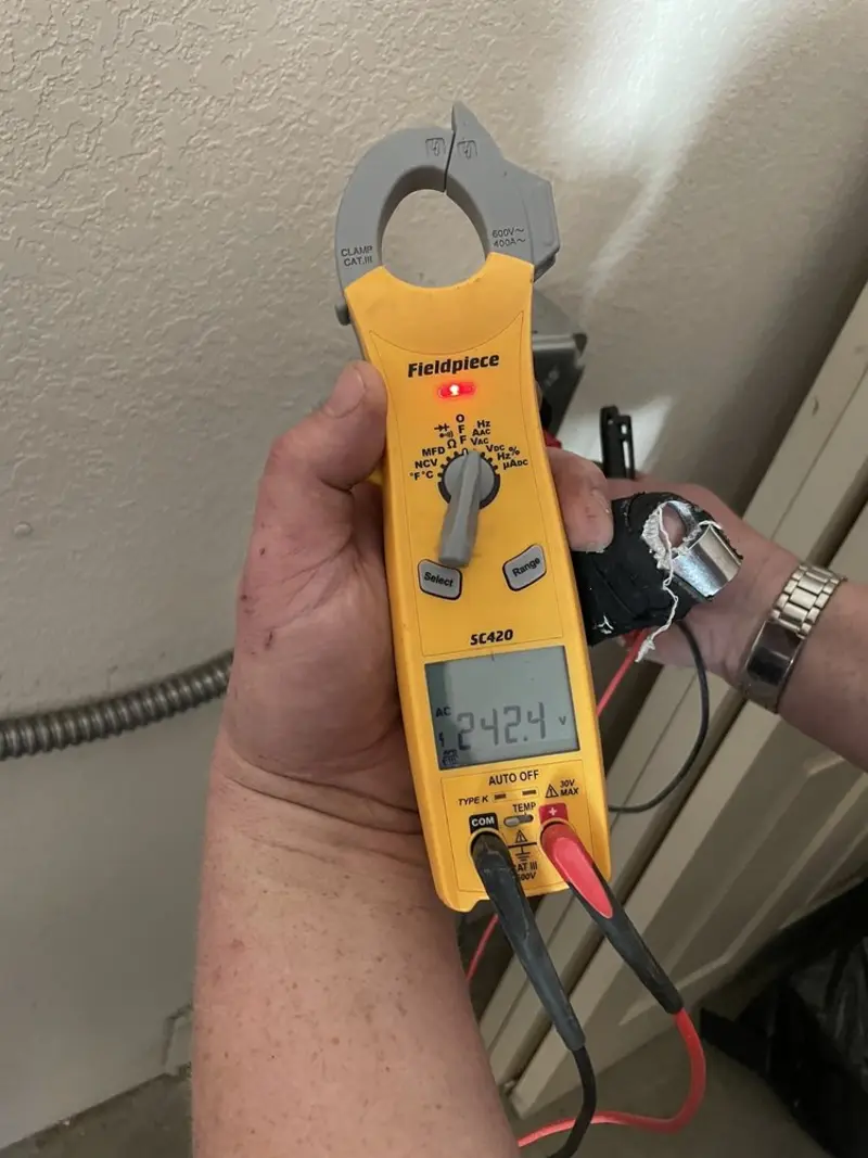 Voltage testing with clamp meter during Generator Installation in Hacienda Heights